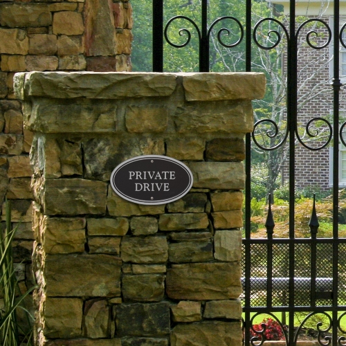 Private Drive Plaque Oval Shape Black & Silver on wall