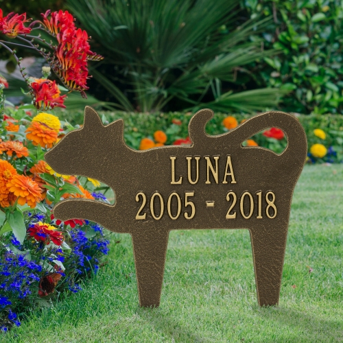 Cat Shaped Memorial Lawn Plaque in Antique Brass in a Blooming Garden
