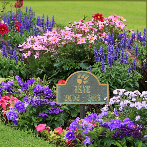 Bronze Verdigris Dog Paw Arch Lawn Memorial Marker in the Garden