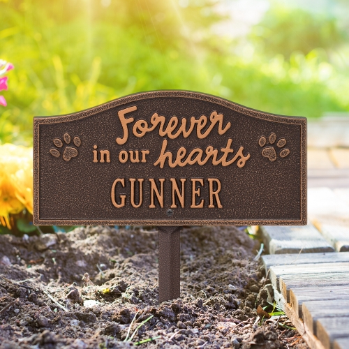 Forever in Our Hearts Memorial Yard Sign in Antique Copper on the sidewalk