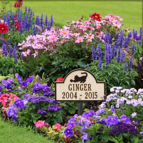 Limestone & Dark Bronze Dog Paw Arch Lawn Memorial Marker  in the  Colorful Vibrant Garden
